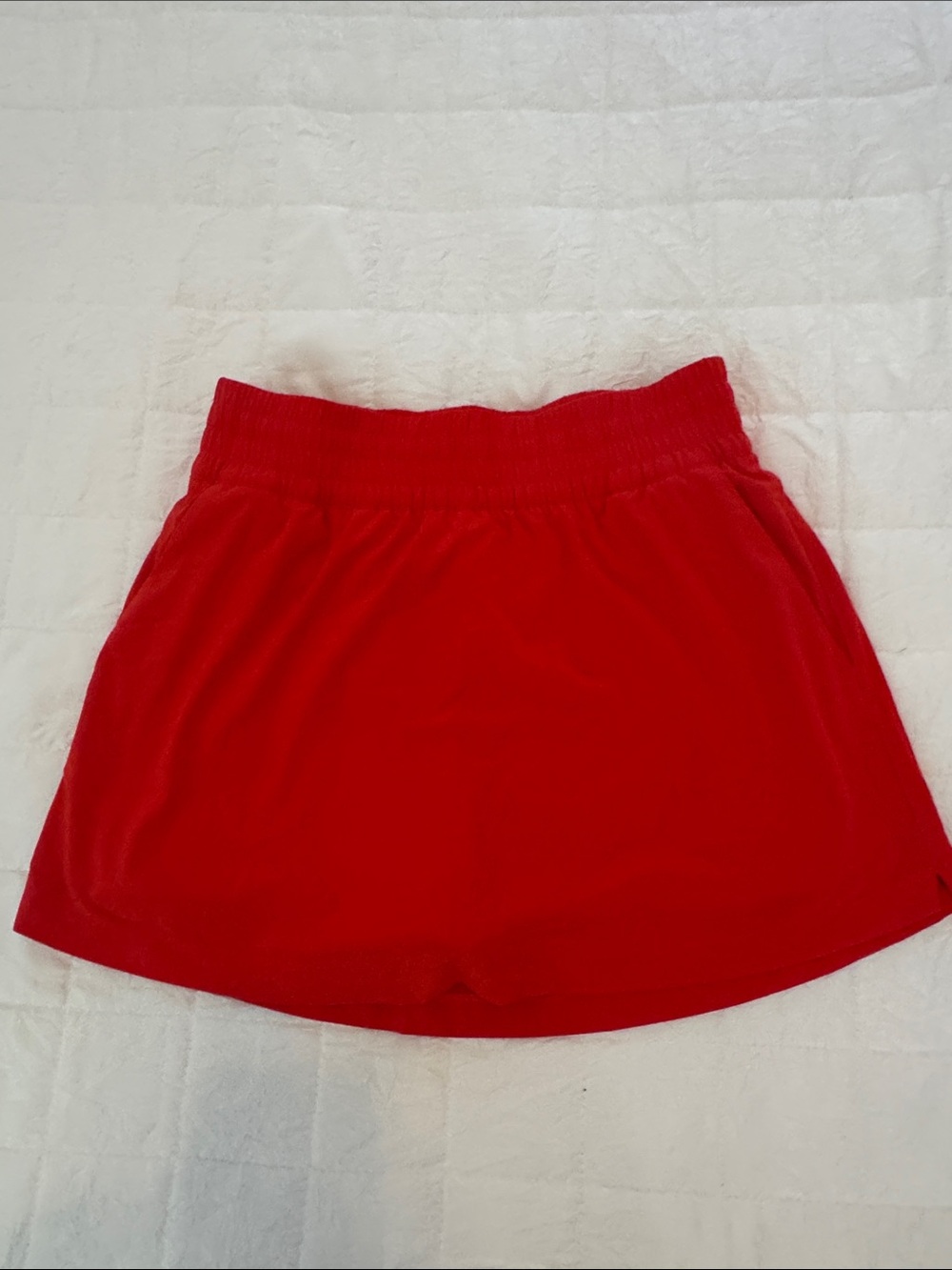Athleta high rise weekender run skort with pockets. Never worn